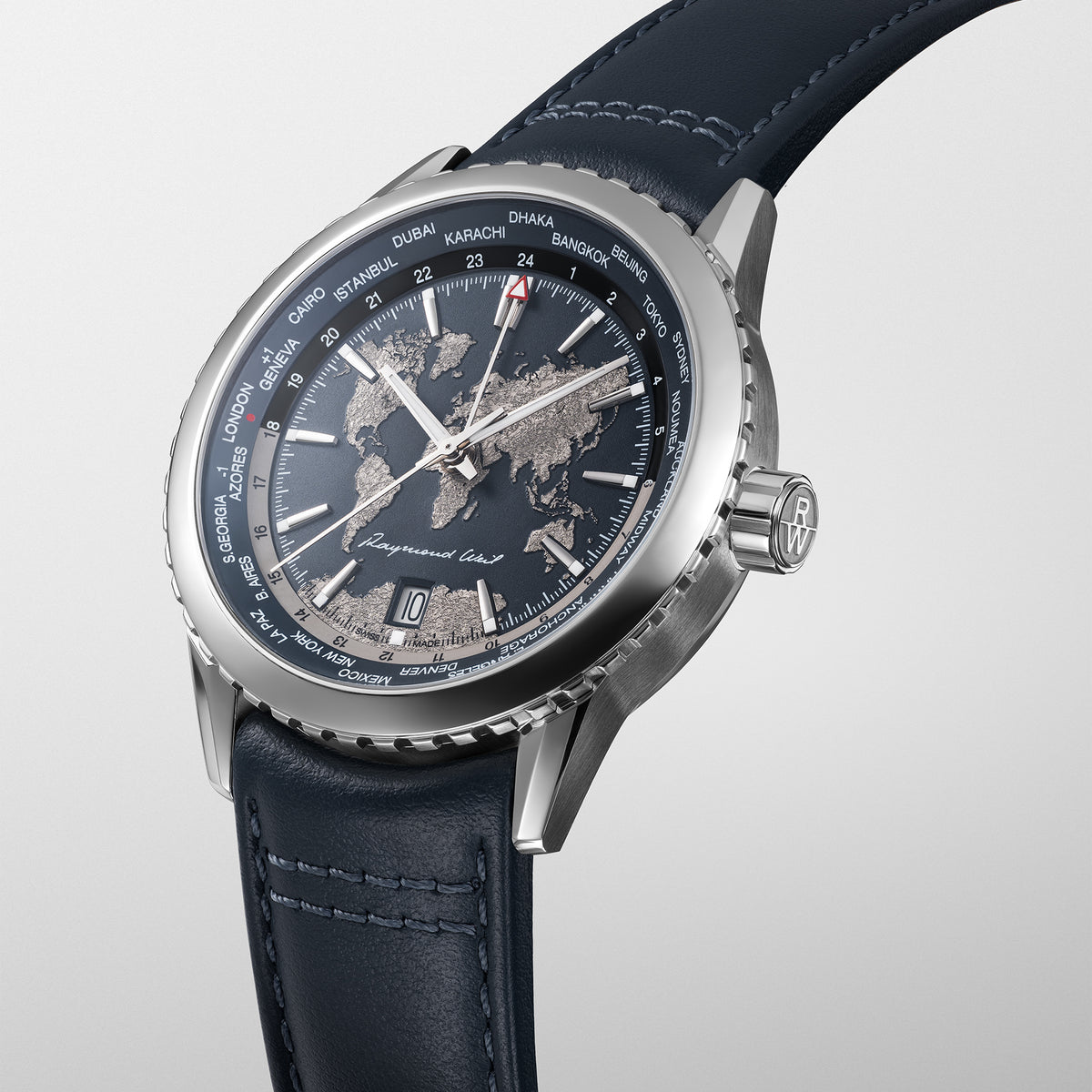 Three-quarter view of Raymond Weil World-Traveller showing its polished case, blue strap and rotating bezel